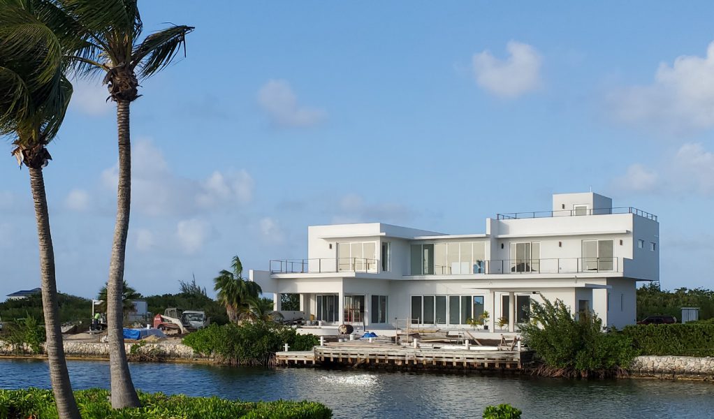 Contemporary villa overlooking tranquil water