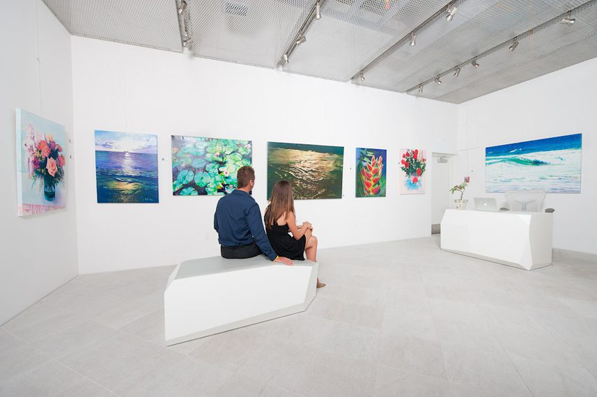 Couple admiring art in gallery